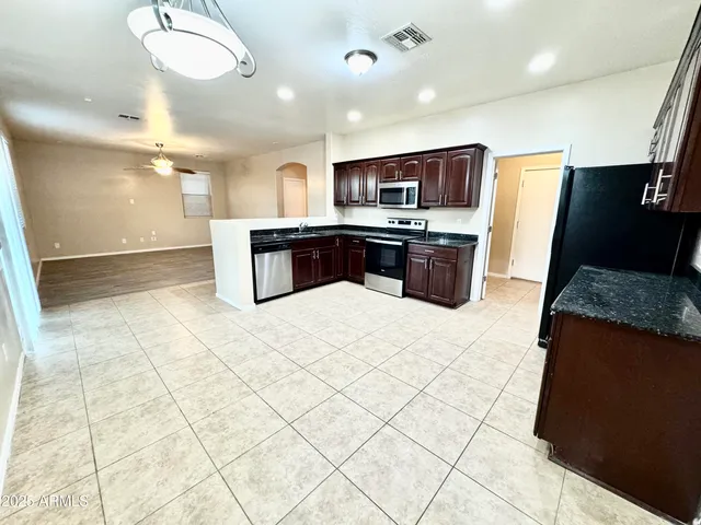 a view of a livingroom with wooden floor