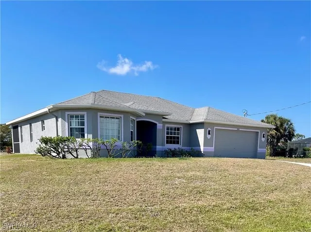 a front view of house with yard