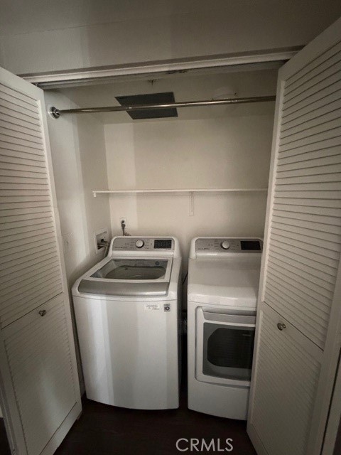 712 East Walnut Street, Unit 306 Pasadena, CA 91101 - Photo 4 of 8 a utility room with dryer and washer