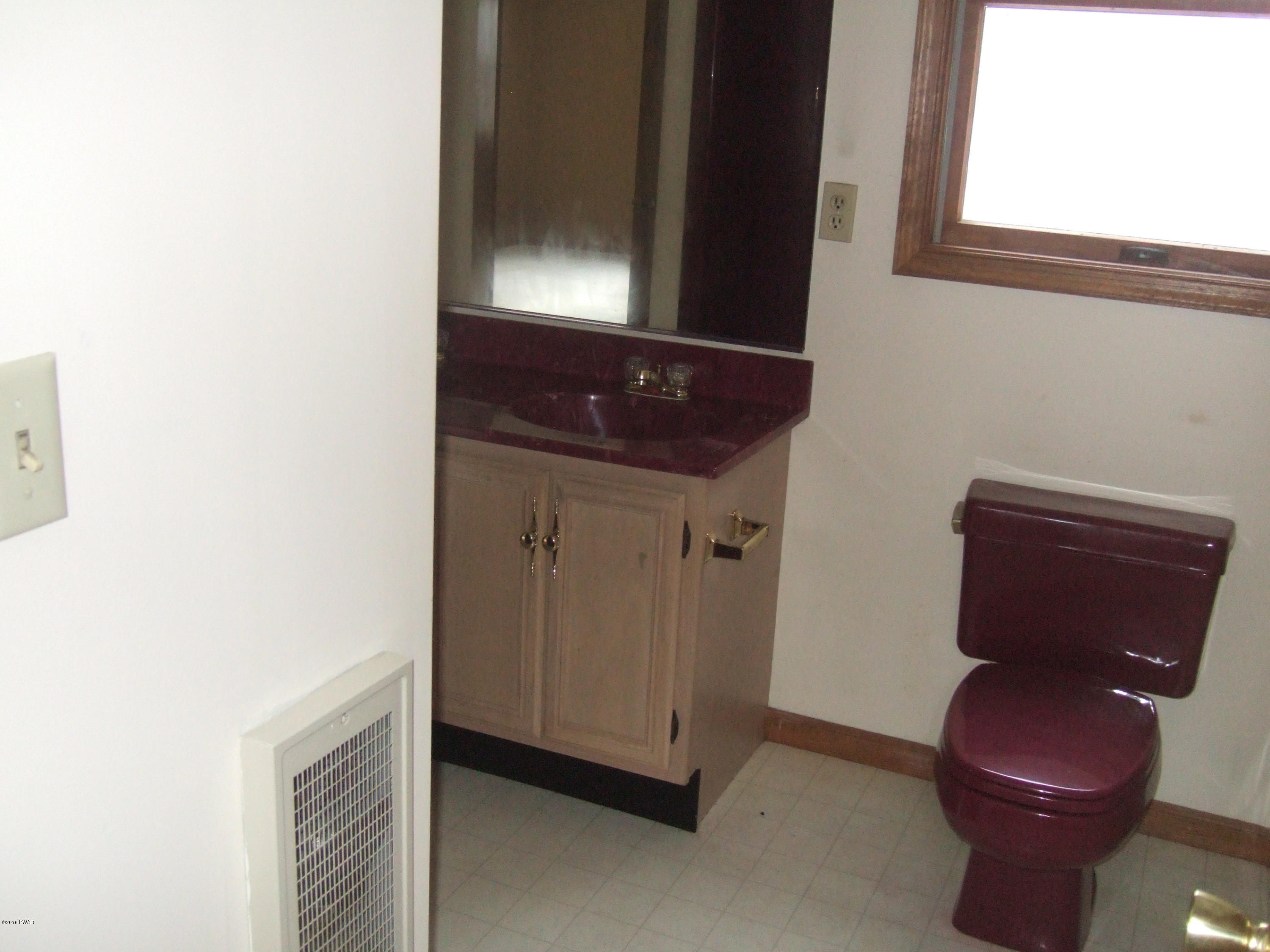 2654 Boulder Road Lake Ariel, PA 18436 - Photo 26 of 40 a bathroom with a toilet and a sink