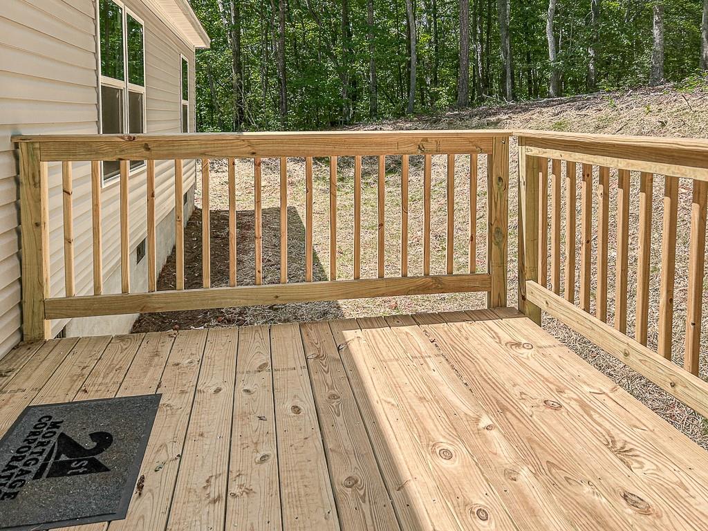 564 Ridge Road Dawsonville, GA 30534 - Photo 12 of 25 a view of wooden balcony