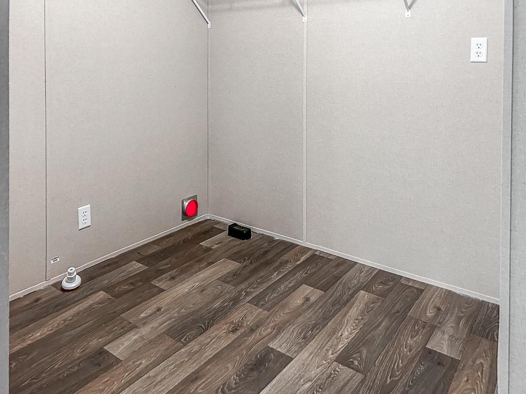 564 Ridge Road Dawsonville, GA 30534 - Photo 13 of 25 a view of a room with wooden floor and cabinets