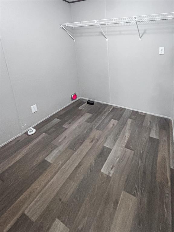 564 Ridge Road Dawsonville, GA 30534 - Photo 14 of 25 a view of a room with racks on the wall