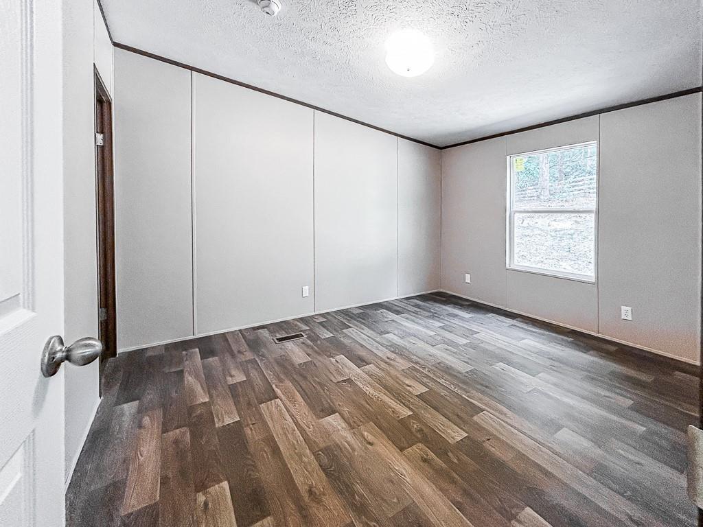 564 Ridge Road Dawsonville, GA 30534 - Photo 17 of 25 an empty room with windows