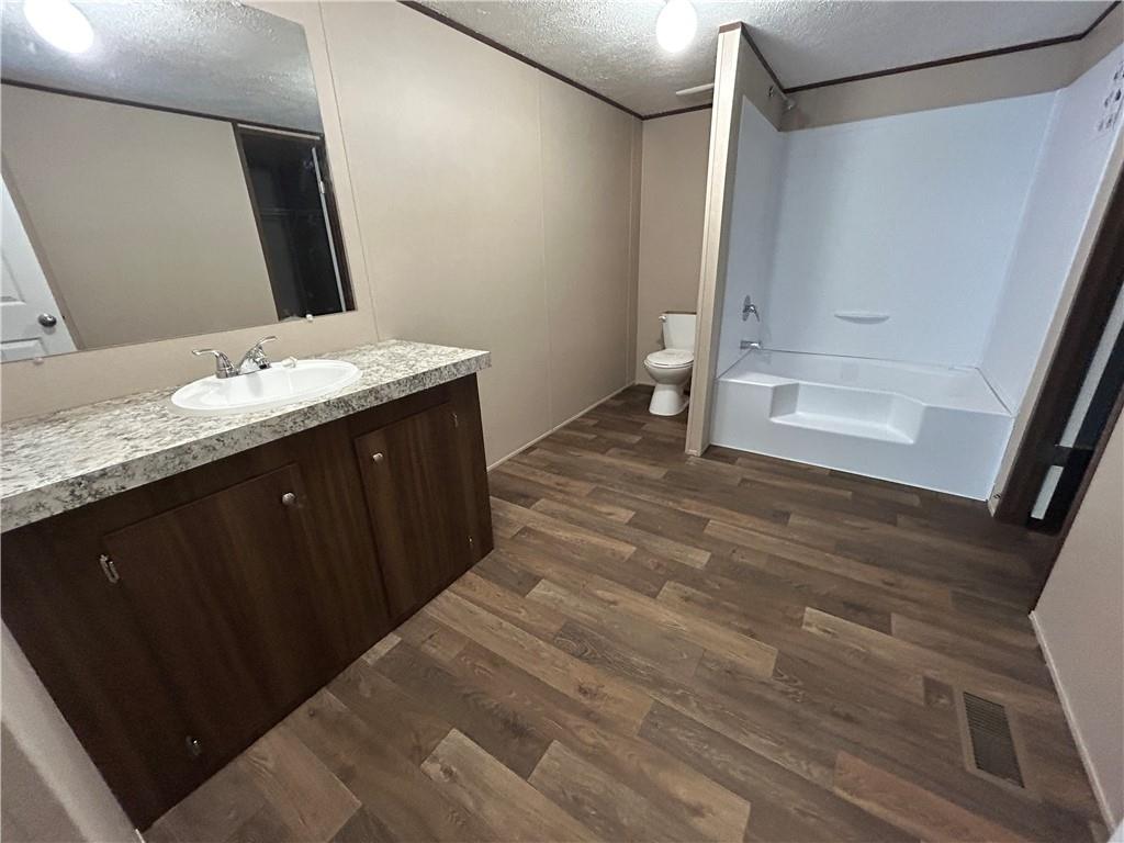 564 Ridge Road Dawsonville, GA 30534 - Photo 7 of 25 a bathroom with a sink and a mirror