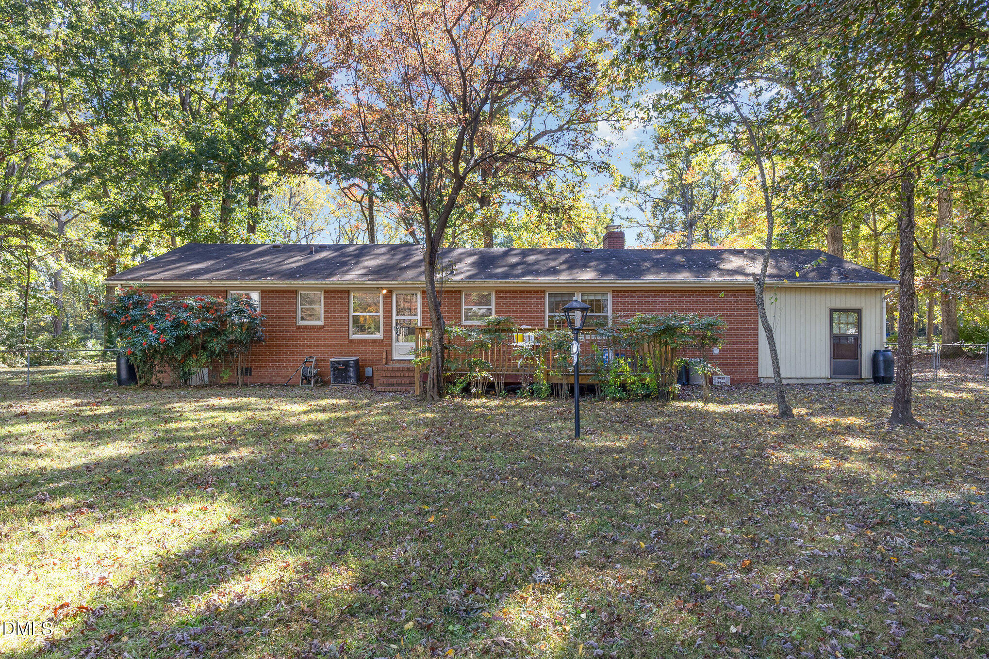3009 Hickory Road Raleigh, NC 27616 - Photo 12 of 19 a view of a house with a yard and large tree
