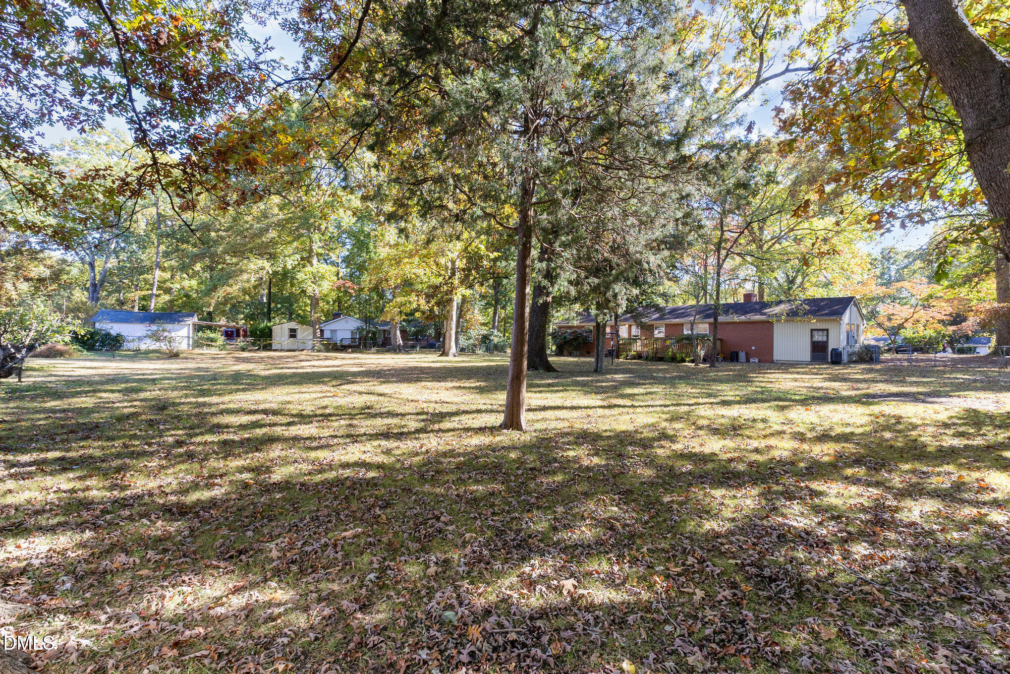 3009 Hickory Road Raleigh, NC 27616 - Photo 14 of 19 a house with trees in front of it