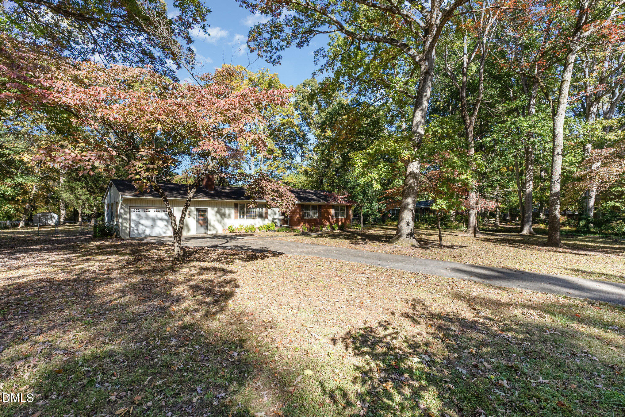 3009 Hickory Road Raleigh, NC 27616 - Photo 16 of 19 a view of a yard with a tree