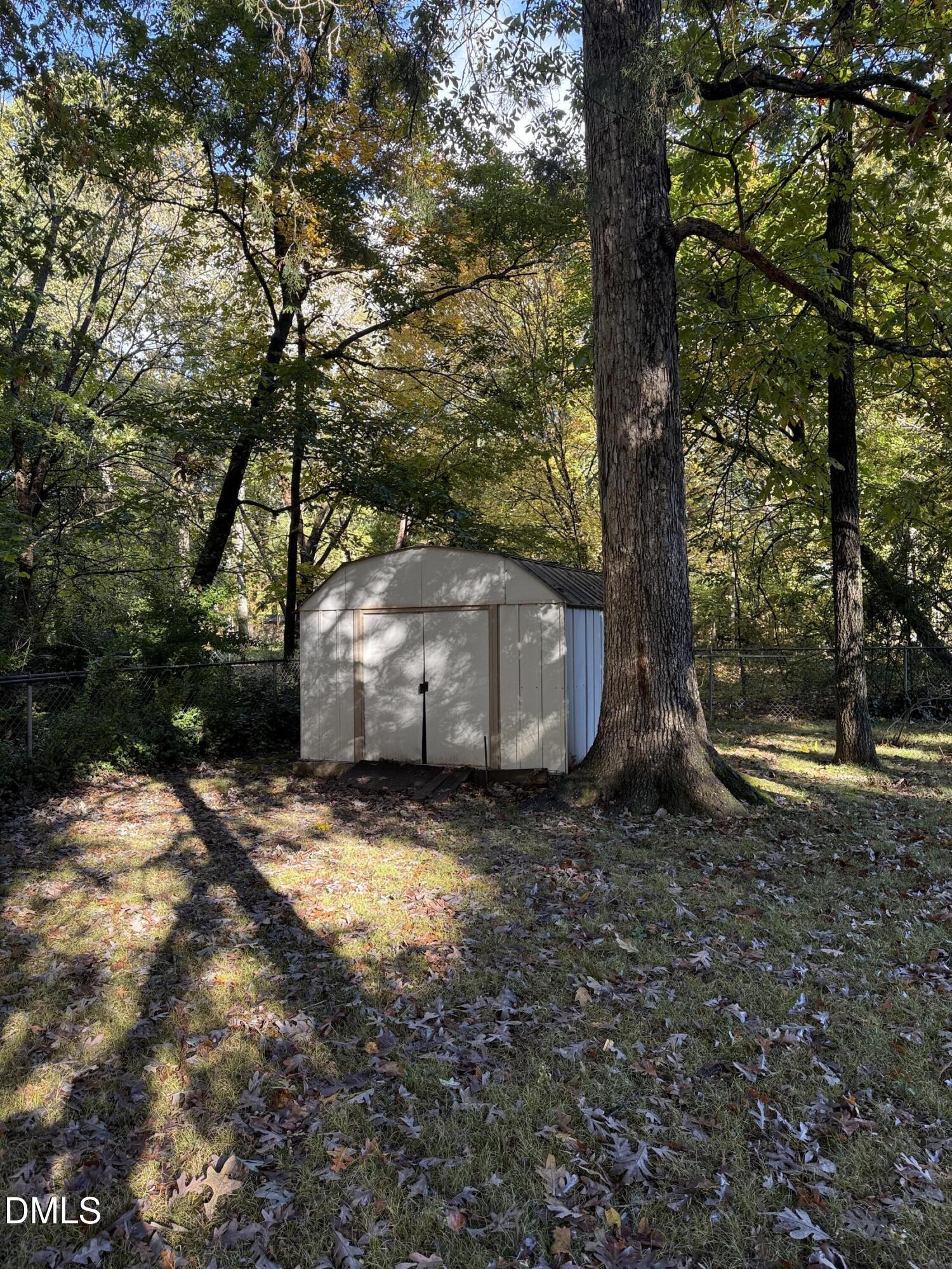 3009 Hickory Road Raleigh, NC 27616 - Photo 18 of 19 a view of a backyard with large tree