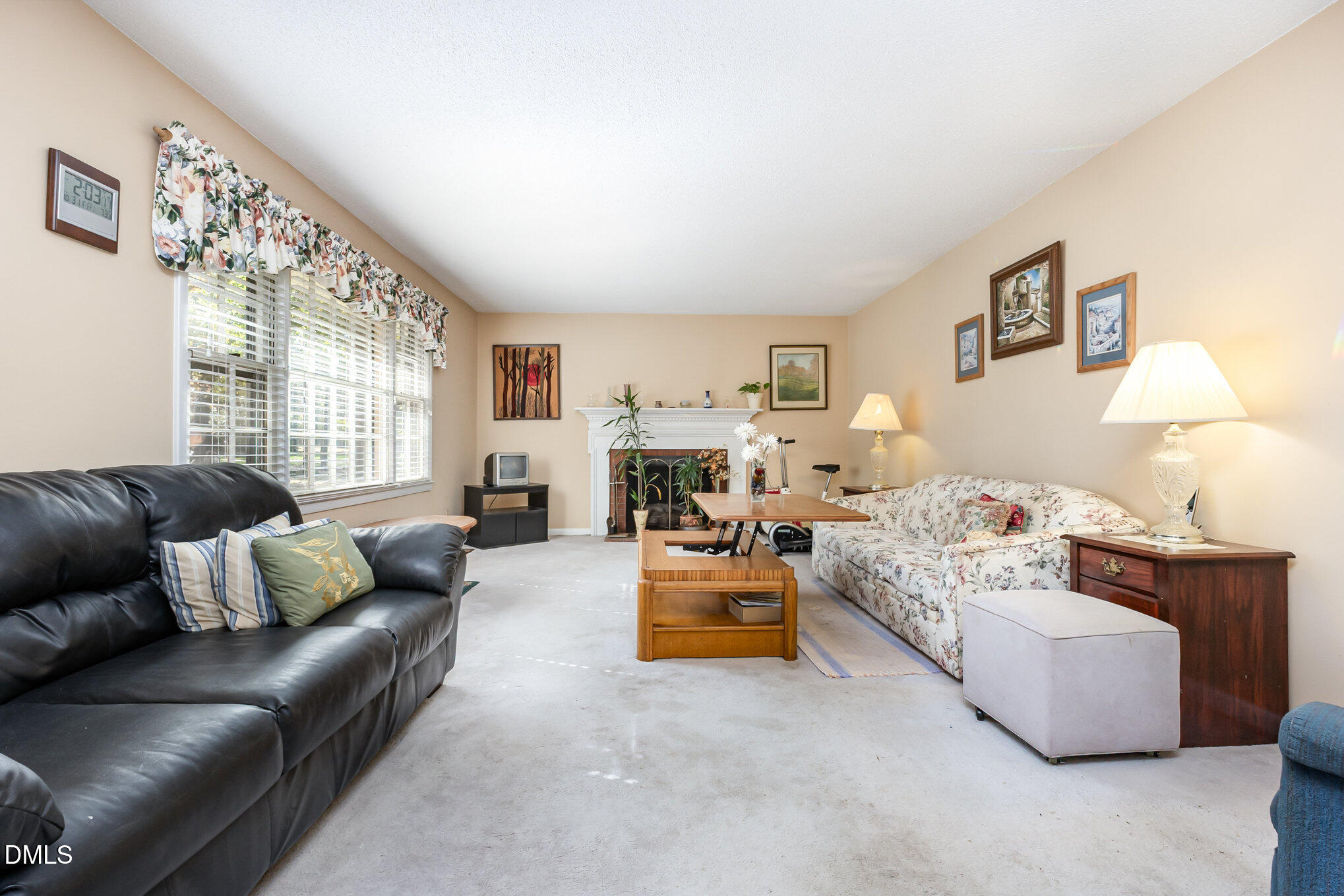 3009 Hickory Road Raleigh, NC 27616 - Photo 2 of 19 a living room with furniture and a large window