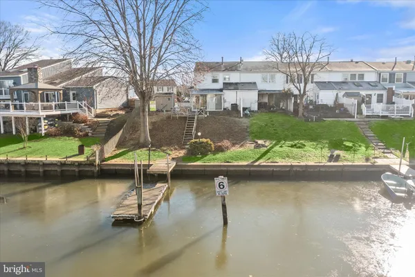 a view of a lake with a house