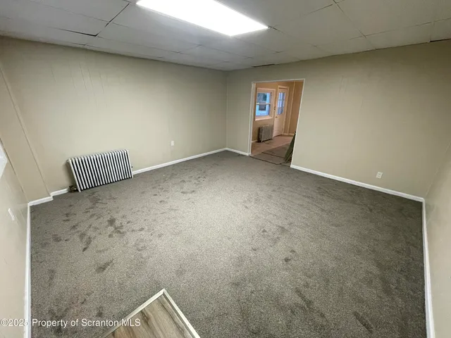 a view of a livingroom with a staircase