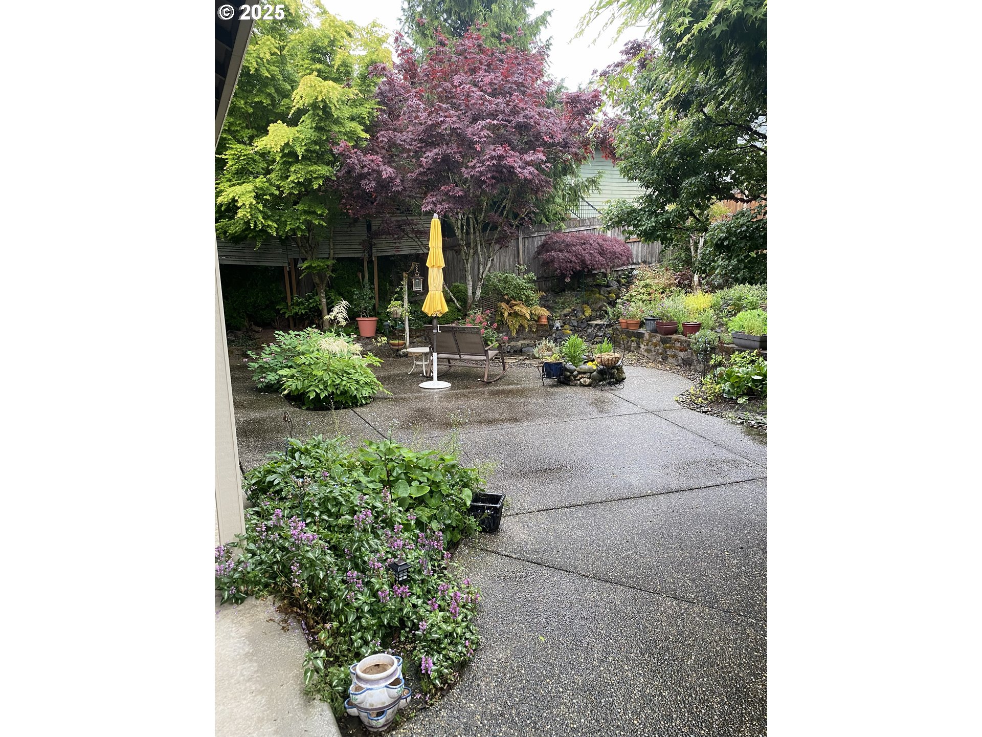 1035 East Pioneer Loop La Center, WA 98629 - Photo 43 of 43 a view of a backyard with plants and a garden