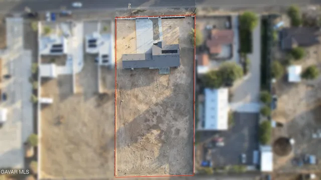 a view of kitchen with cabinets and wooden floor