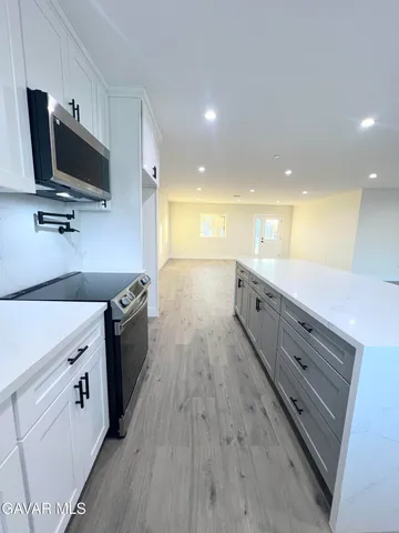 a bathroom with a bathtub toilet and shower