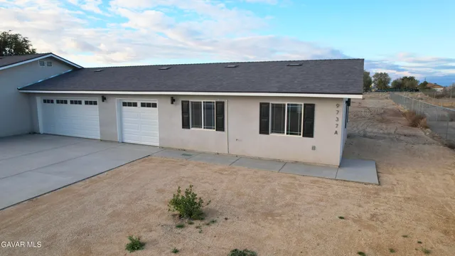 a view of a terrace with sitting area