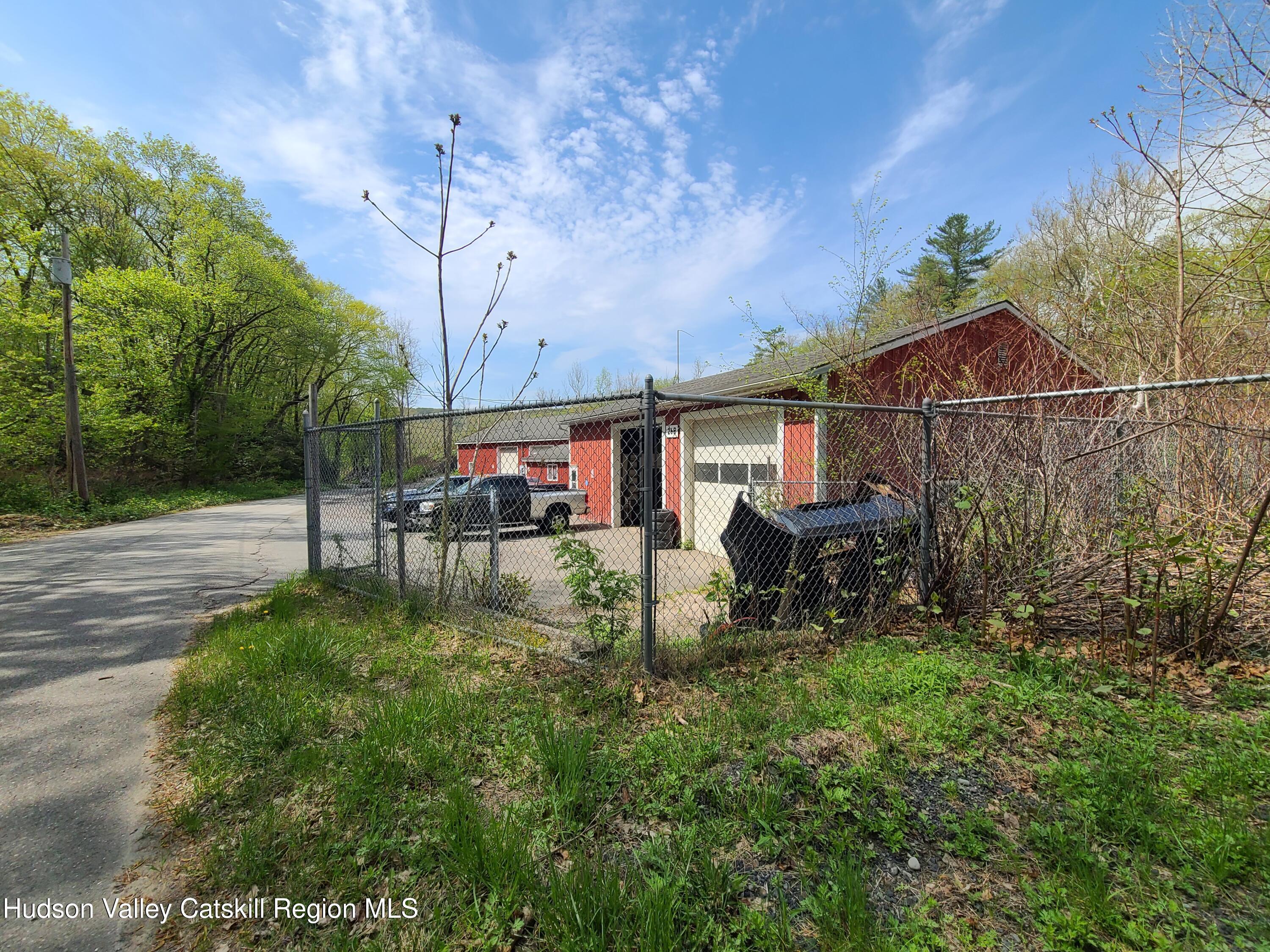 26-48 Hook Road Sparrow Bush, NY 12780 - Photo 17 of 32 a view of a house with backyard and sitting area