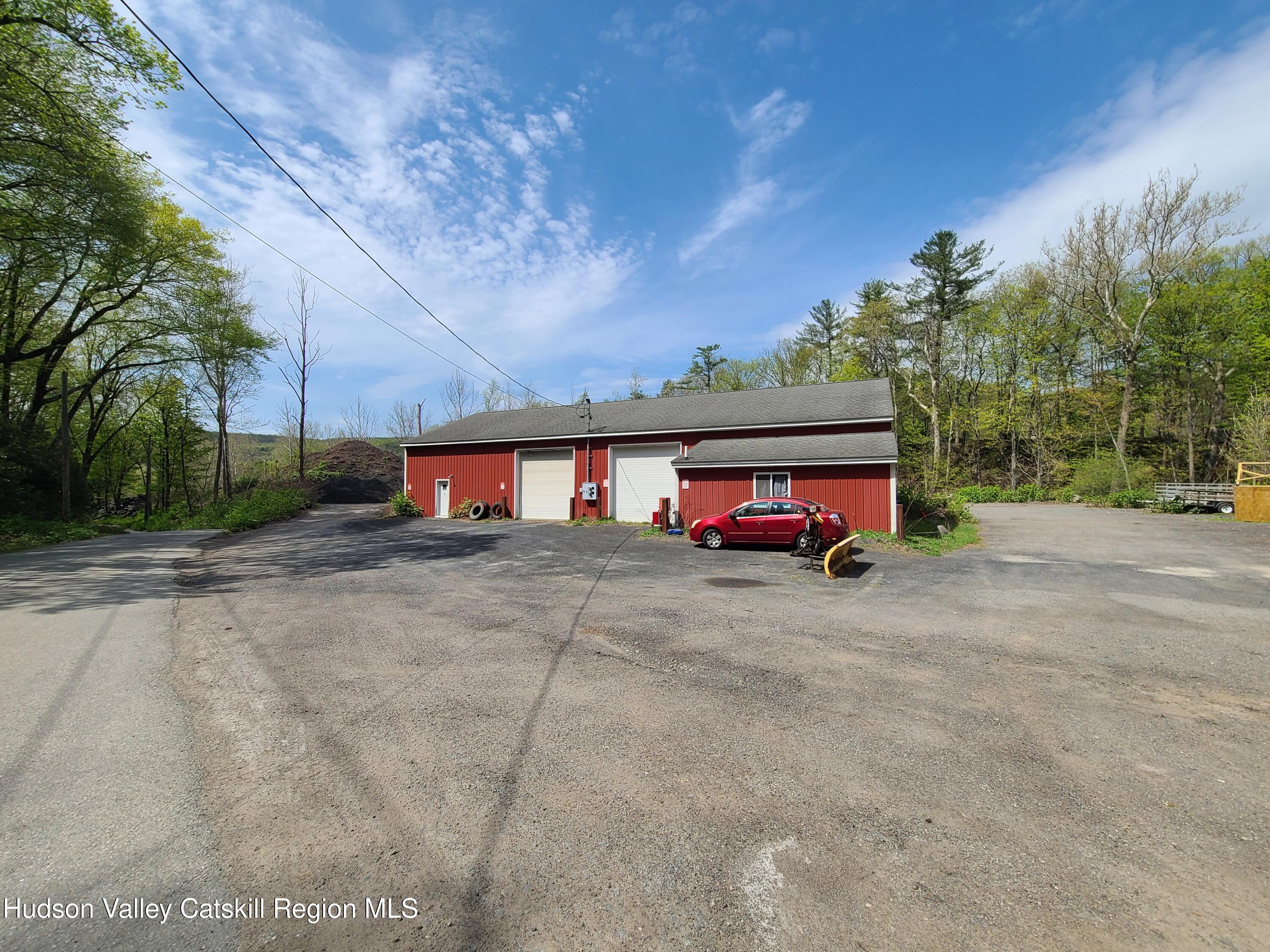 26-48 Hook Road Sparrow Bush, NY 12780 - Photo 18 of 32 a view of a car is parked on the side of the road