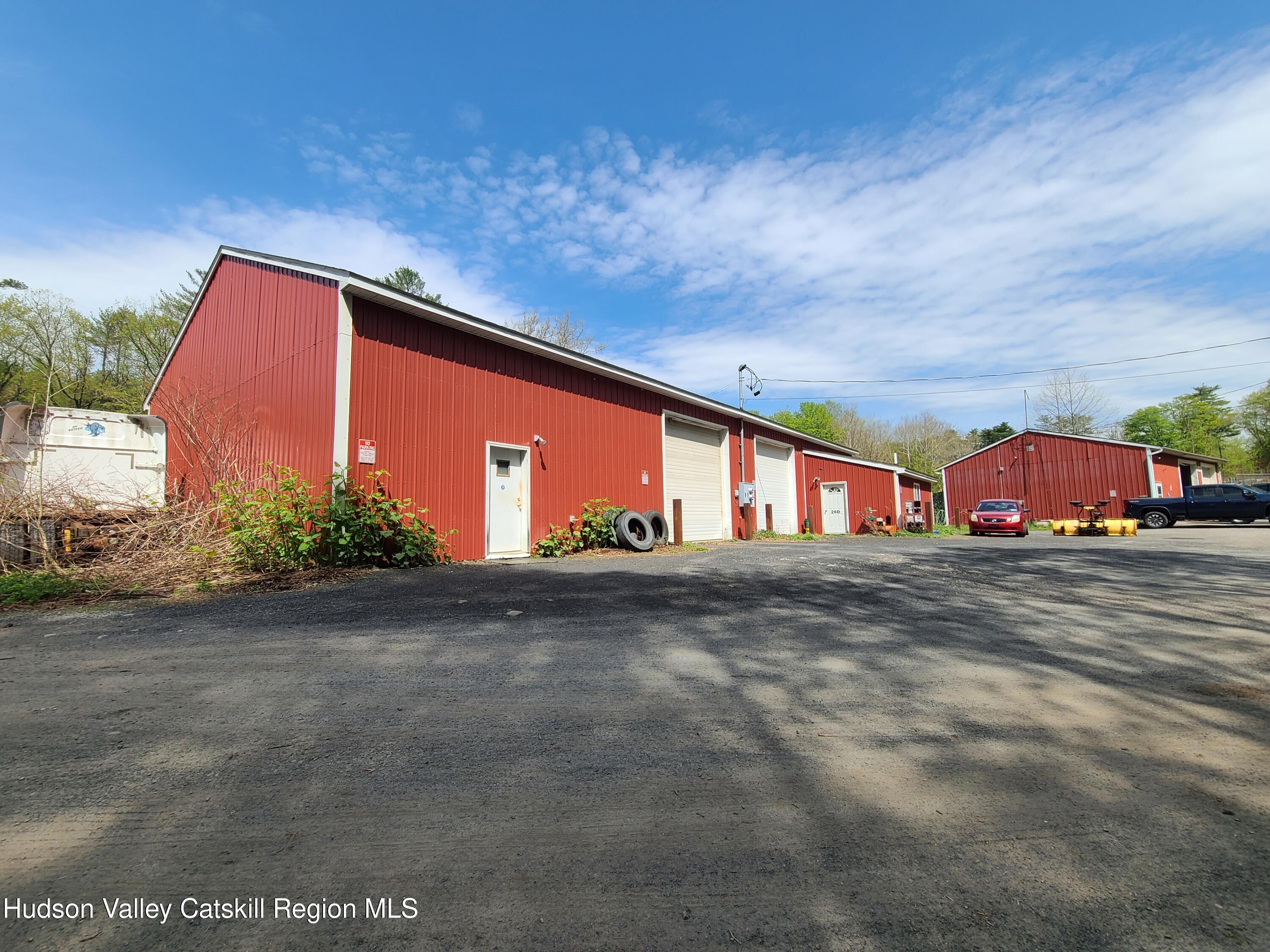 26-48 Hook Road Sparrow Bush, NY 12780 - Photo 21 of 32 a view of a large building with a road and plants