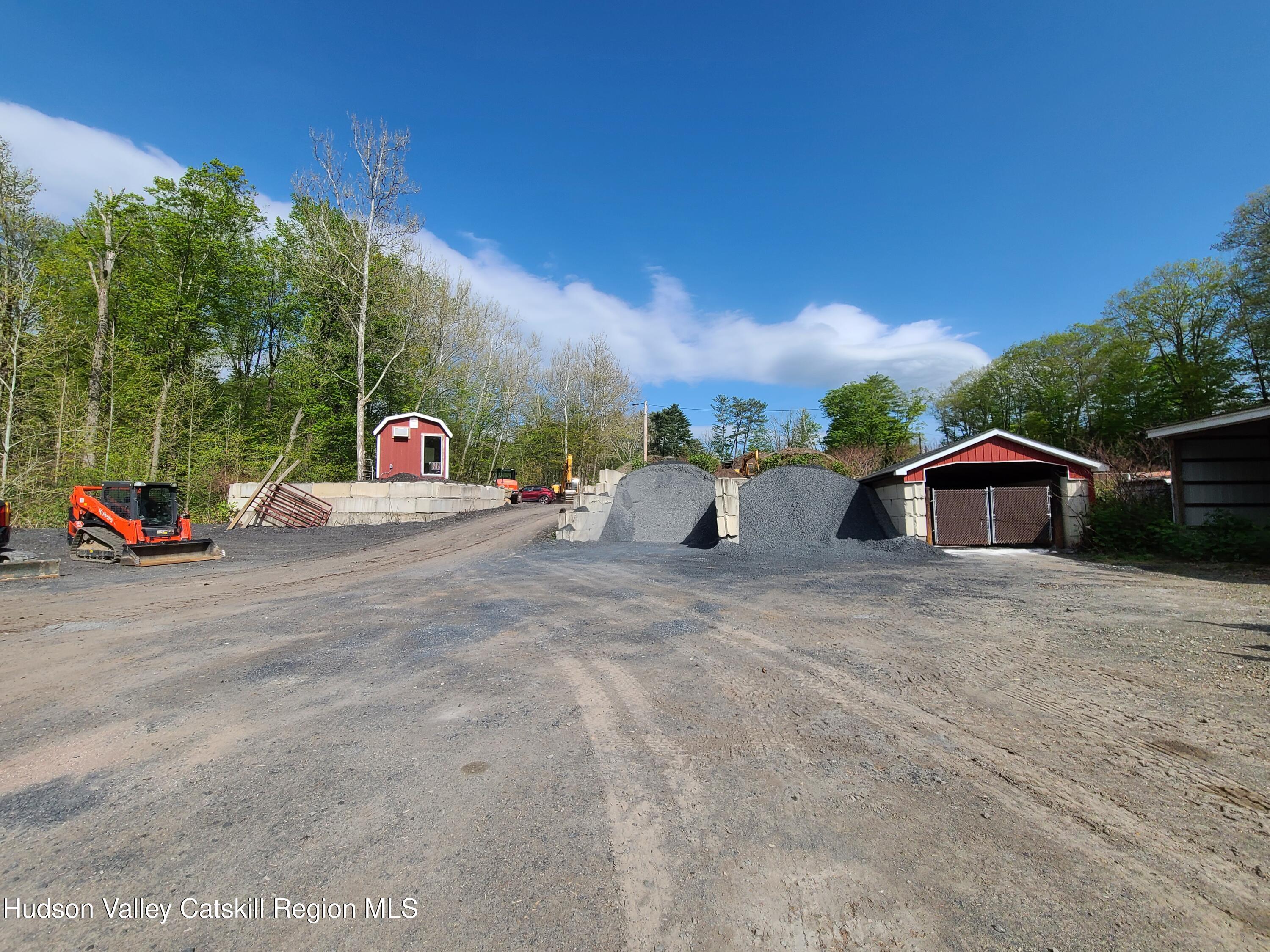 26-48 Hook Road Sparrow Bush, NY 12780 - Photo 23 of 32 a row of potted plants in front of a building