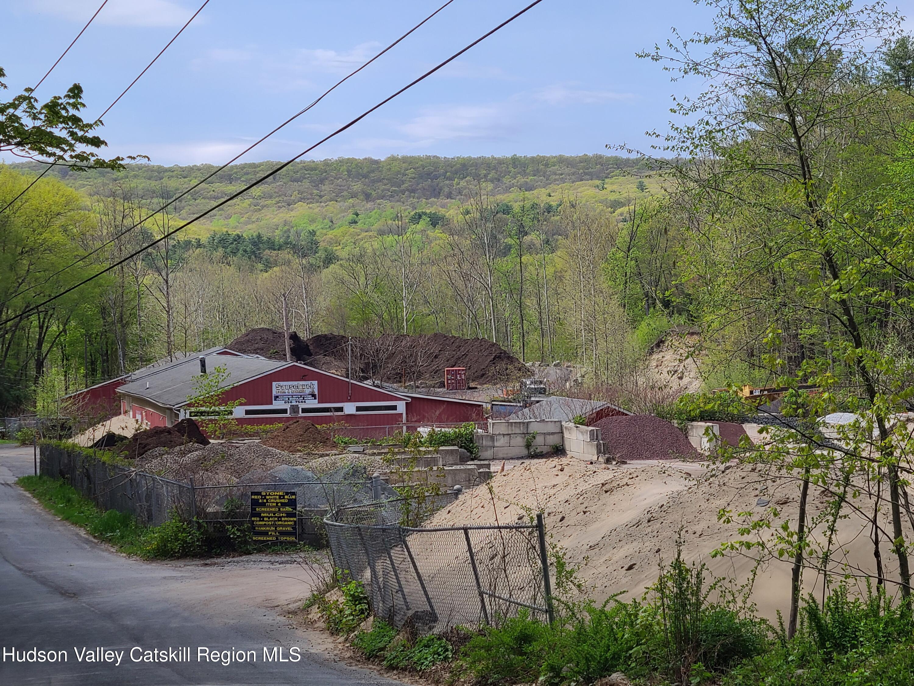 26-48 Hook Road Sparrow Bush, NY 12780 - Photo 7 of 32 a view of a street with a yard