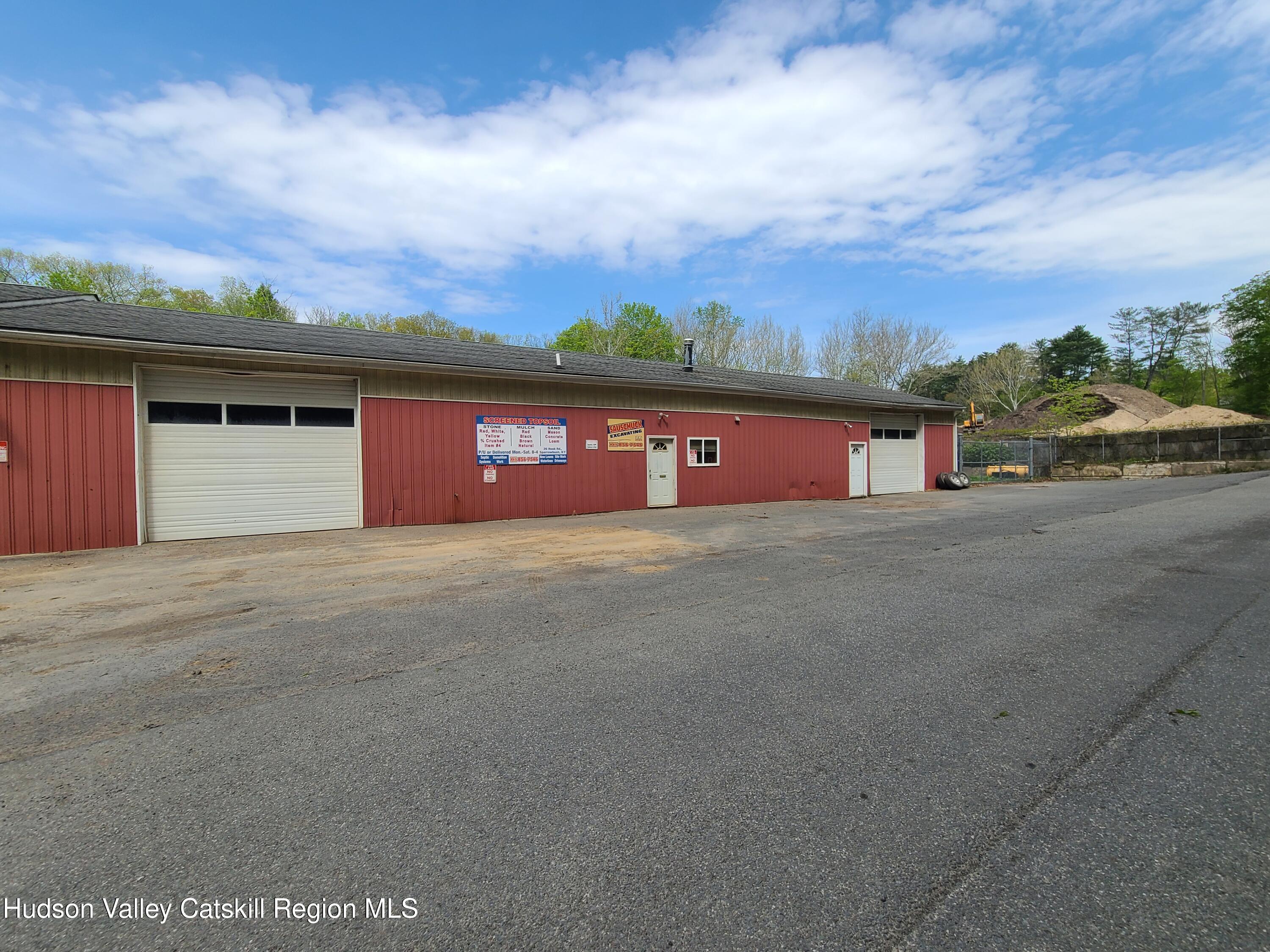 26-48 Hook Road Sparrow Bush, NY 12780 - Photo 9 of 32 a front view of a house with a yard