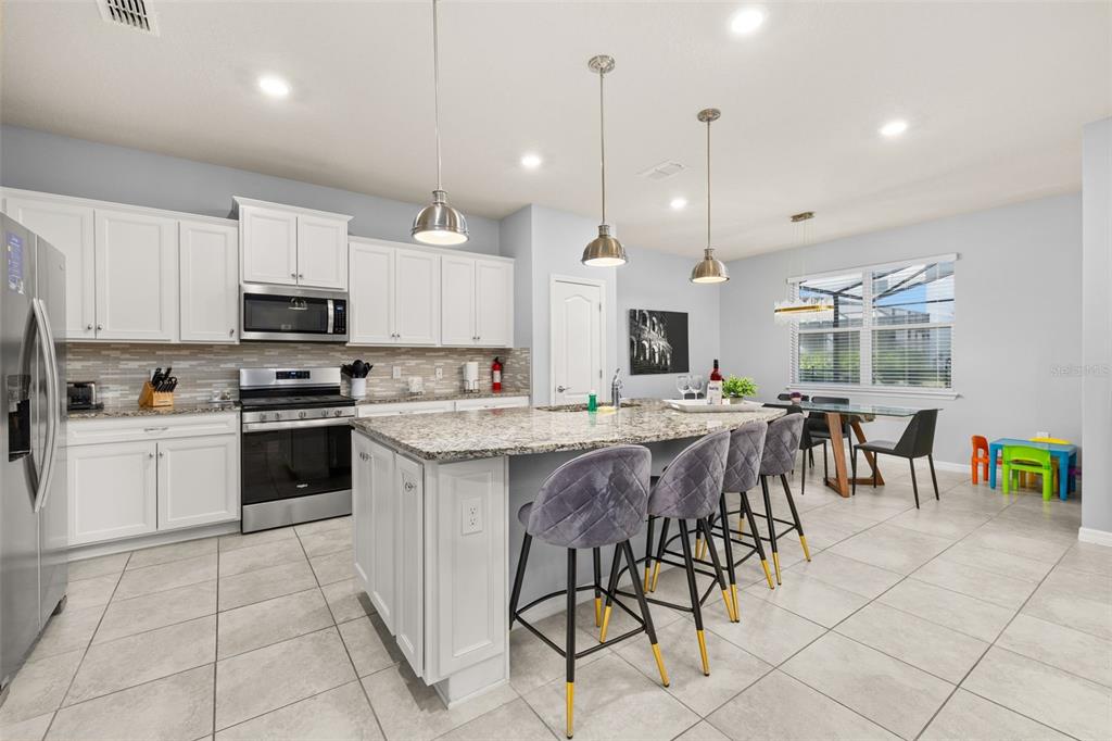 7184 Oakmoss Loop Davenport, FL 33837 - Photo 8 of 92