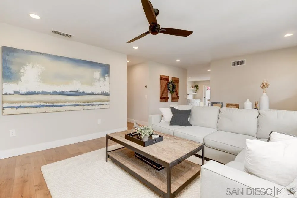9944 Connell Road San Diego, CA 92131 - Photo 5 of 25 a living room with furniture and a window