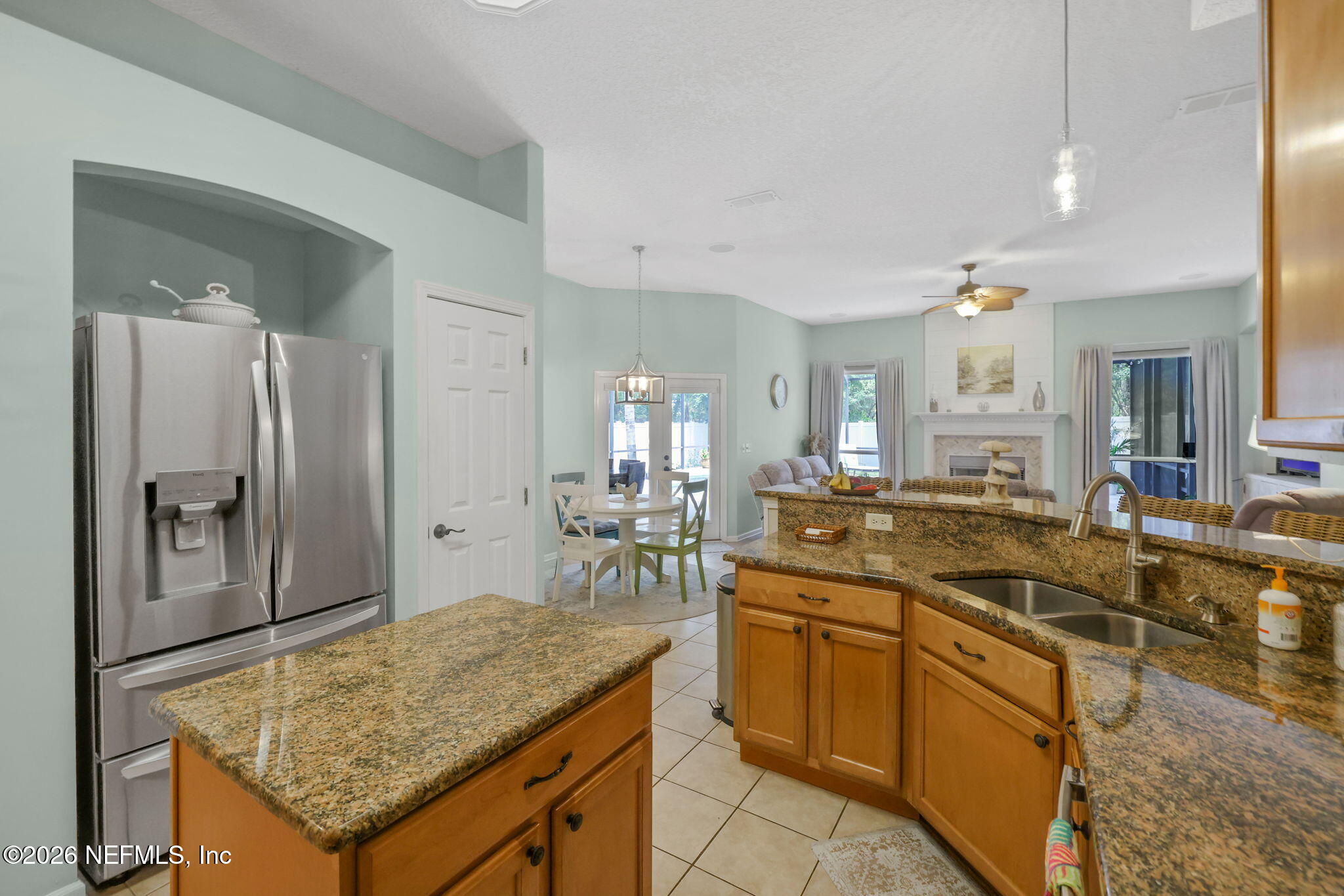 4320 Rye Court St. Johns, FL 32259 - Photo 19 of 60 a kitchen with stainless steel appliances granite countertop a sink and refrigerator
