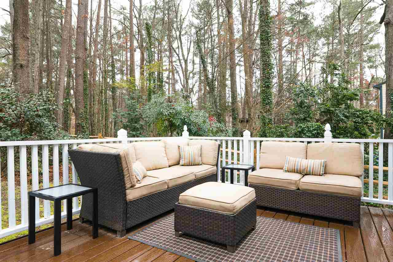 207 Winterberry Ridge Drive Durham, NC 27713 - Photo 23 of 25 Expansive Deck Overlooking Fenced Backyard
