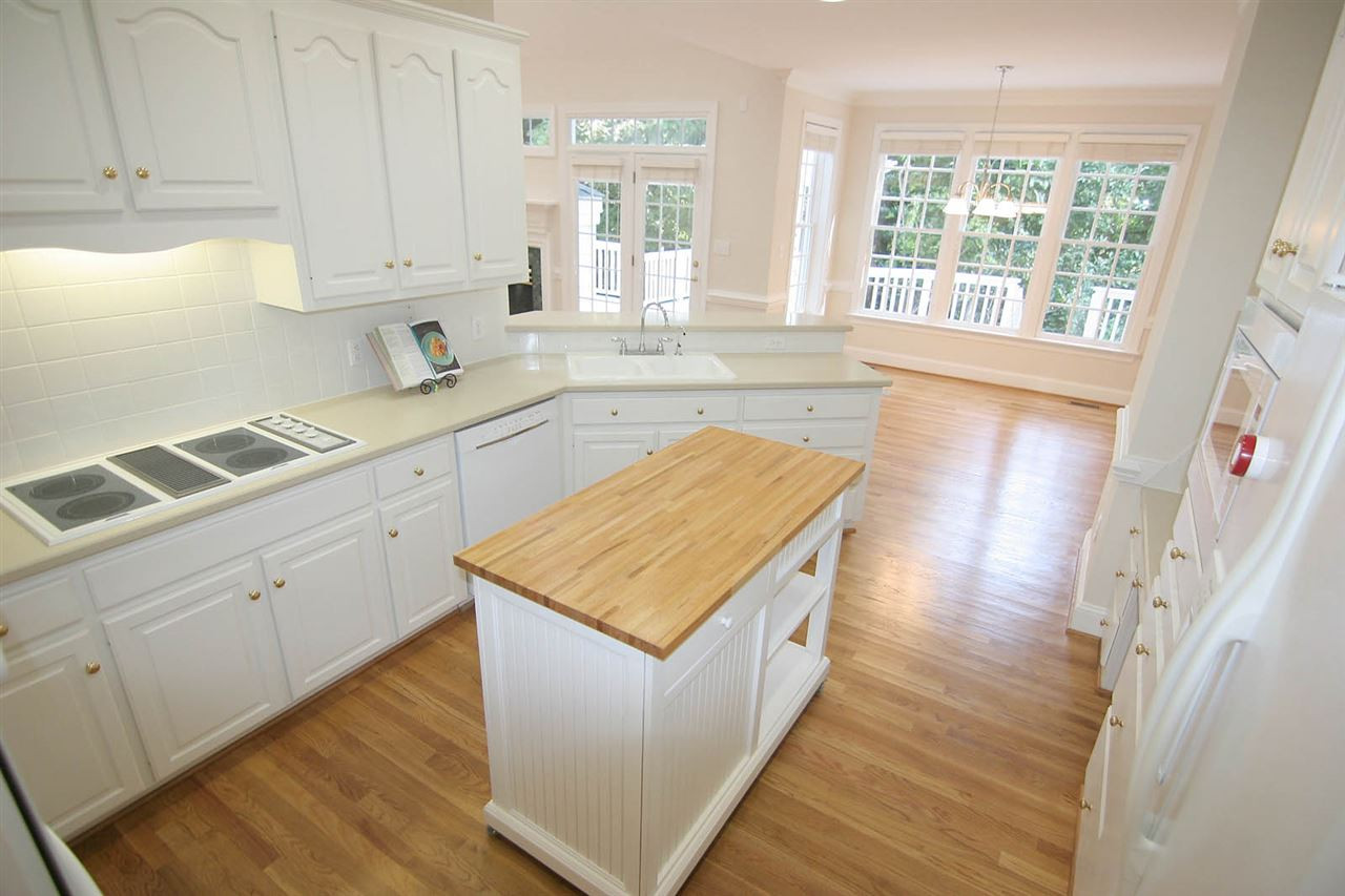 8708 Bell Grove Way Raleigh, NC 27615 - Photo 15 of 25 Kitchen opens to Bfast and Family Rooms