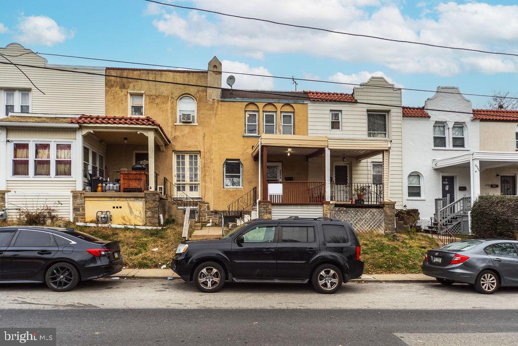 a car parked in front of a house