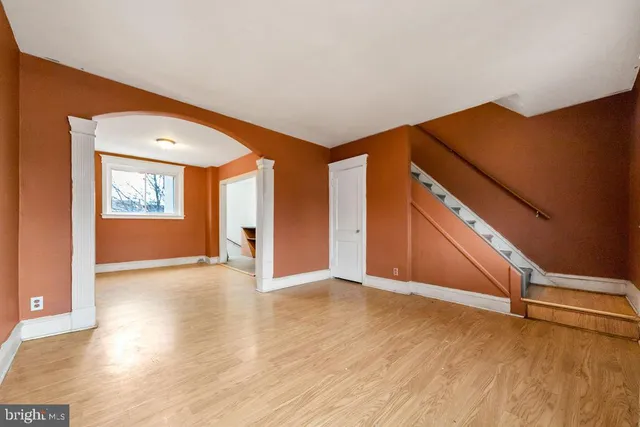 a view of an empty room and window