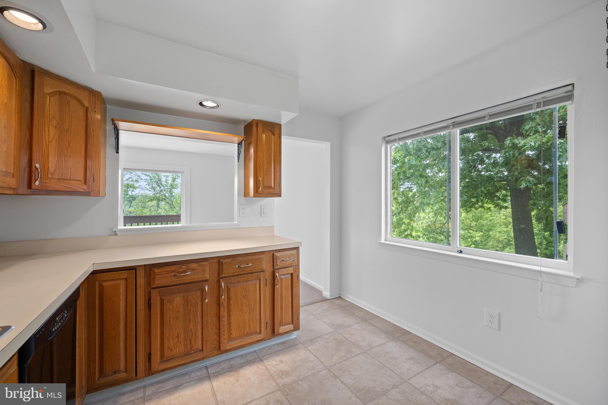 105 Timothy Circle Wayne, PA 19087 - Photo 14 of 31 a utility room with cabinets a sink and a window