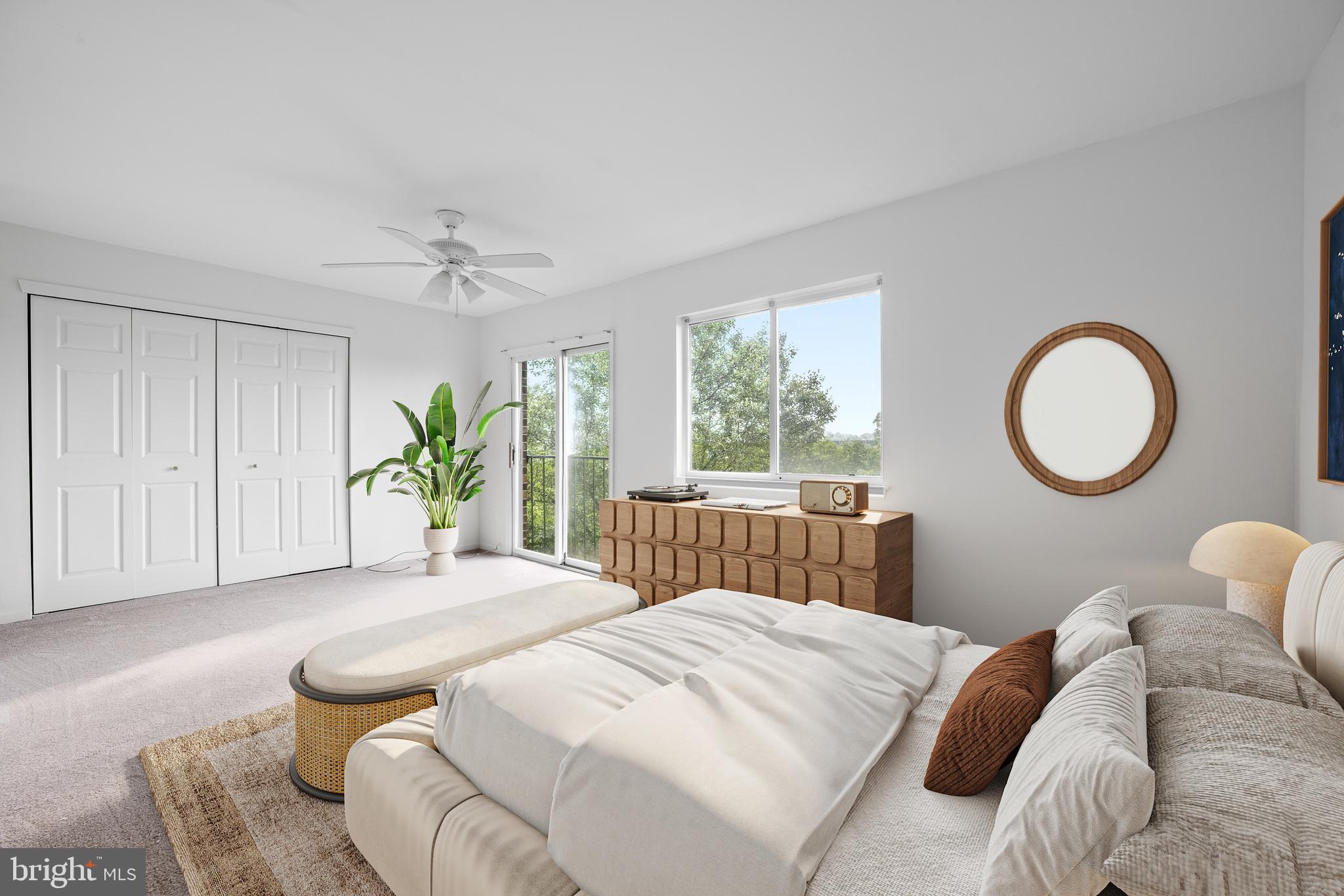 105 Timothy Circle Wayne, PA 19087 - Photo 19 of 31 a bedroom with a bed lamp and a large window