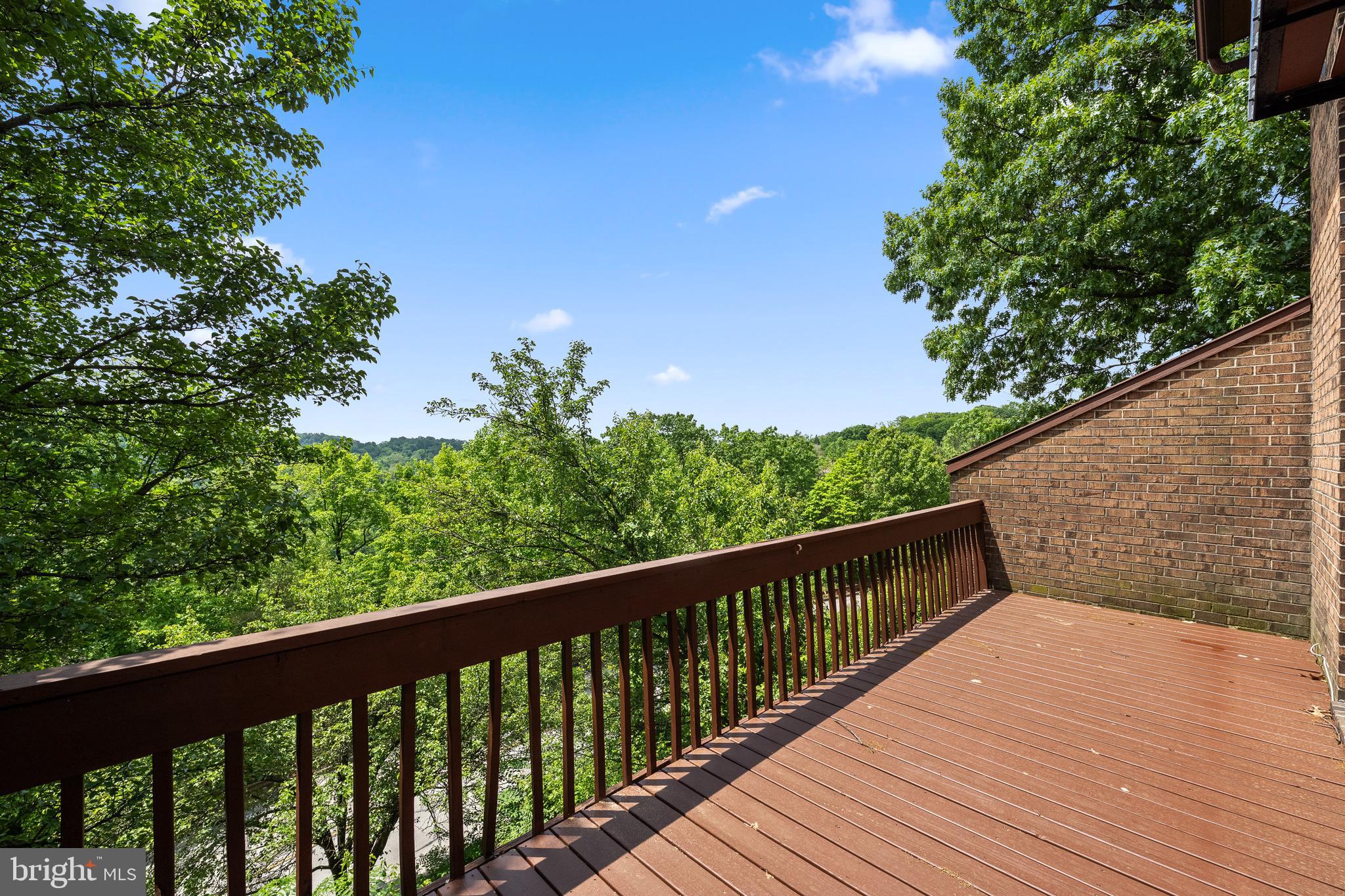 105 Timothy Circle Wayne, PA 19087 - Photo 2 of 31 a balcony with wooden floor and garden space