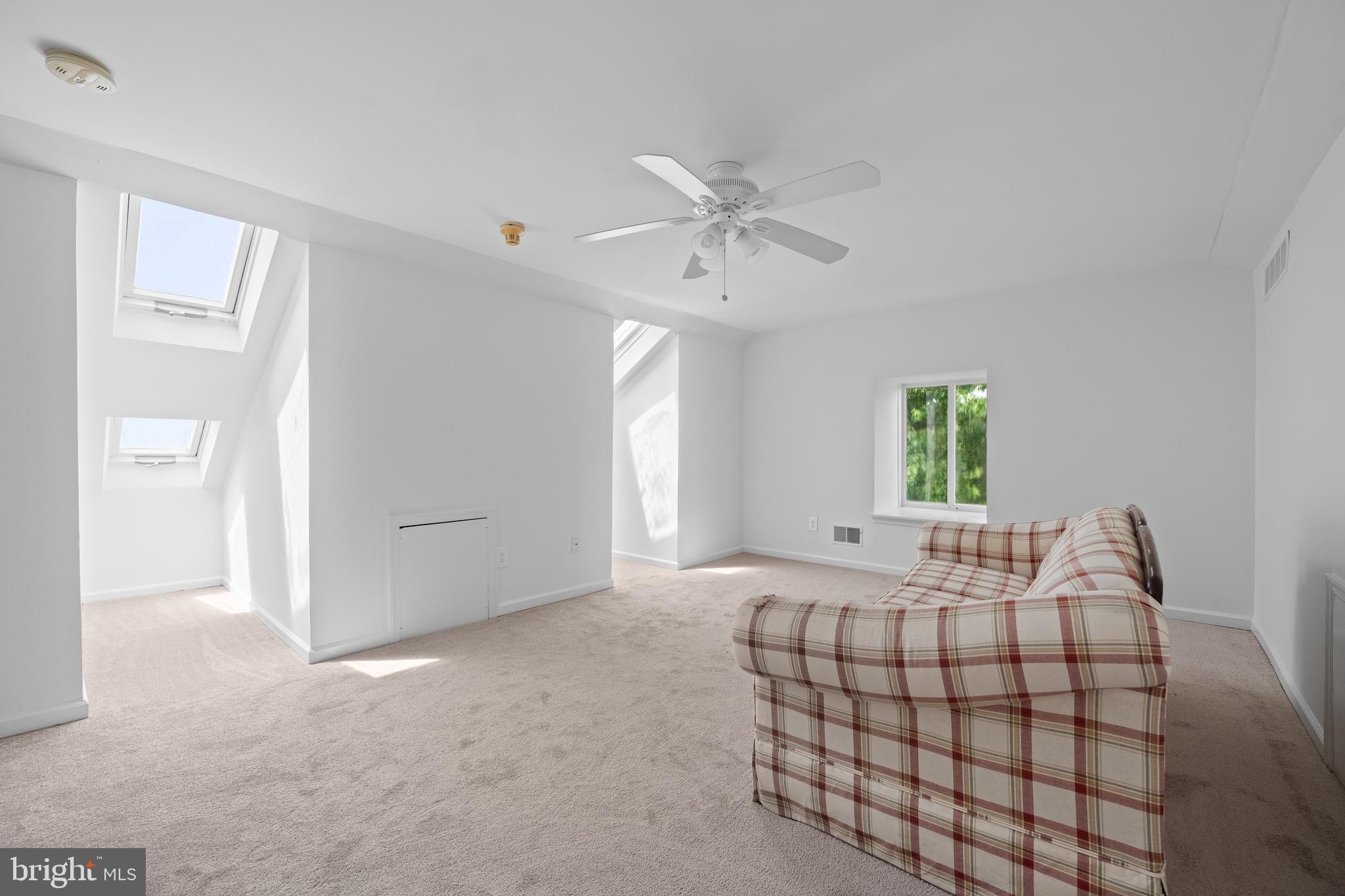 105 Timothy Circle Wayne, PA 19087 - Photo 26 of 31 a bedroom with a bed and a chandelier