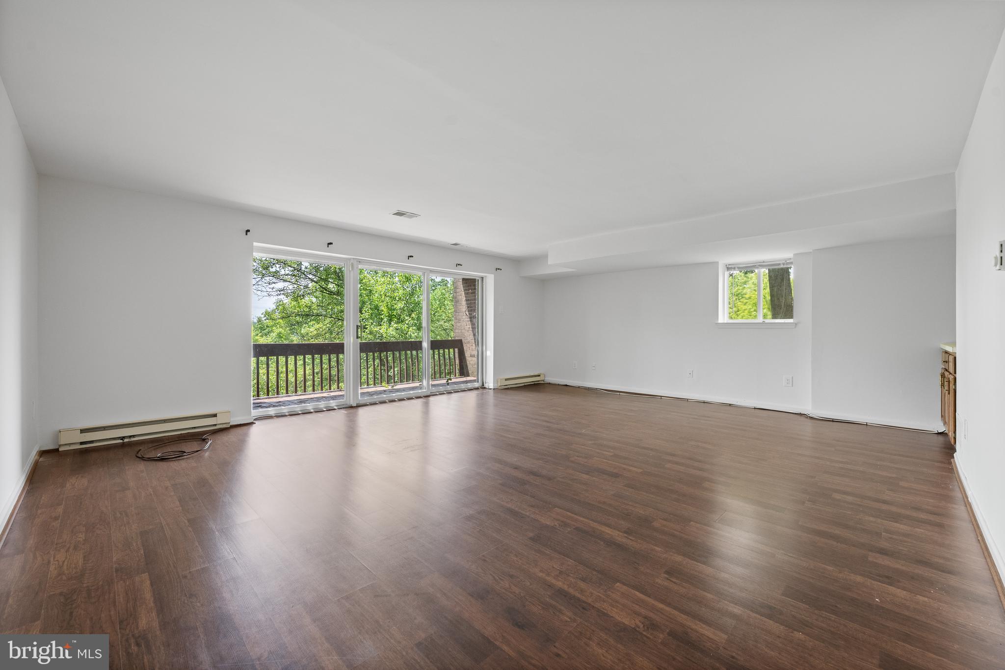 105 Timothy Circle Wayne, PA 19087 - Photo 31 of 31 a view of an empty room with wooden floor and a window
