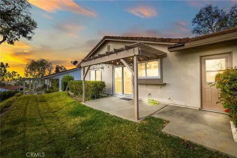 a house view with a garden space