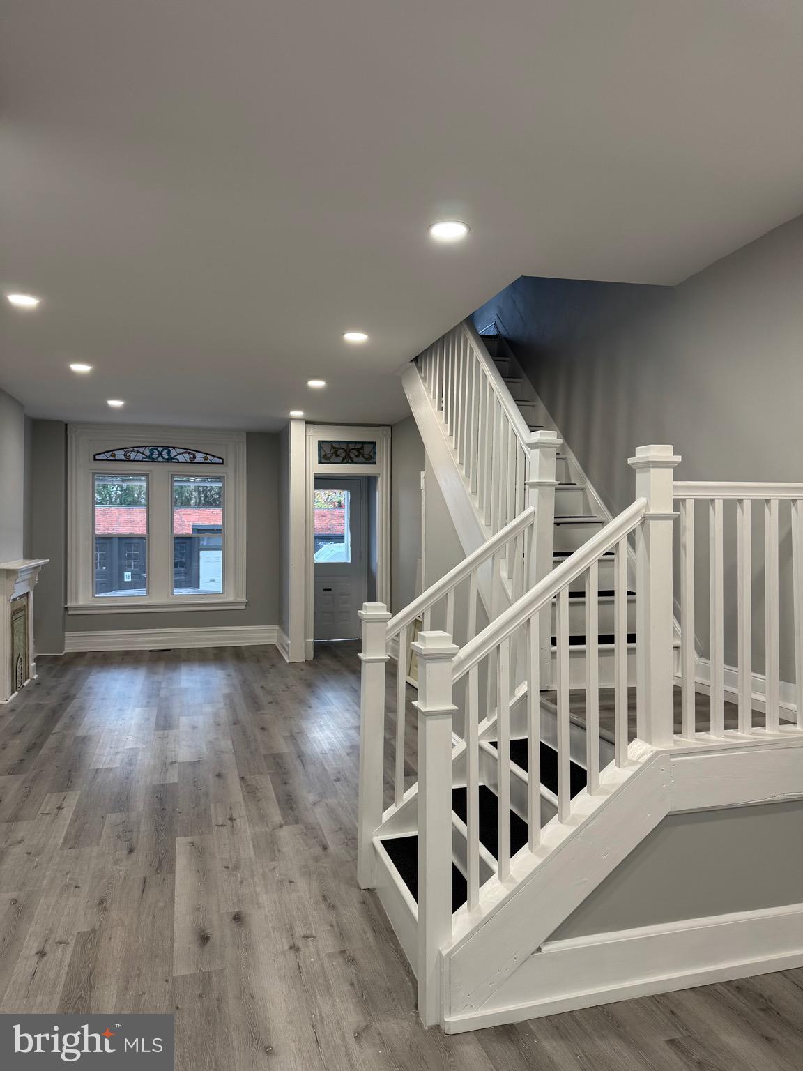 521 Windsor Street Reading, PA 19601 - Photo 2 of 14 a view of entryway and hall with wooden floor