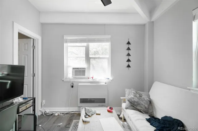 a kitchen with cabinets and window