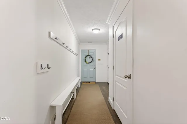 a view of storage and utility room with washer and dryer
