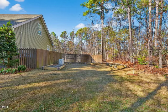 a view of an empty room with a balcony