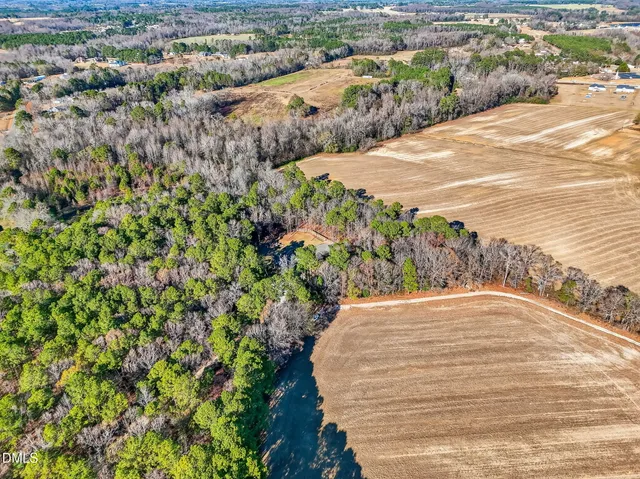 a view of a backyard of the house