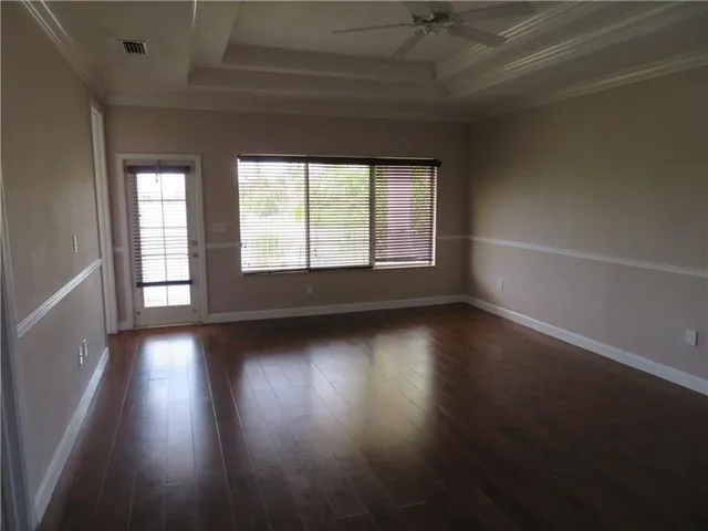 a view of a room that has a window in it