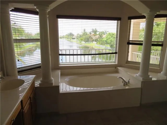a view of a kitchen with a sink