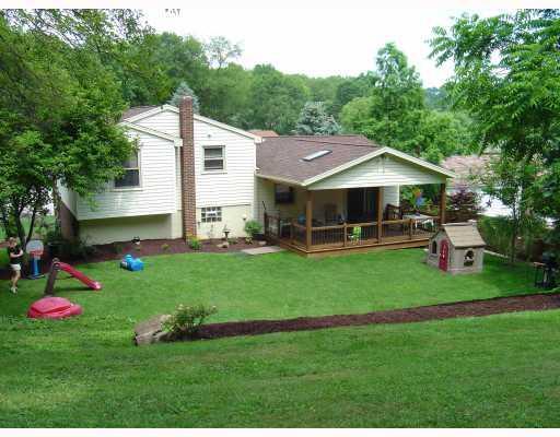 Exterior Back. LUSH GREEN YARD WITH LOADS OF PRIVACY  - GREAT FIND IN HOLIDAY PARK