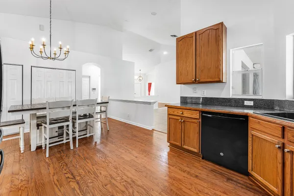 a utility room with closet dryer and washer