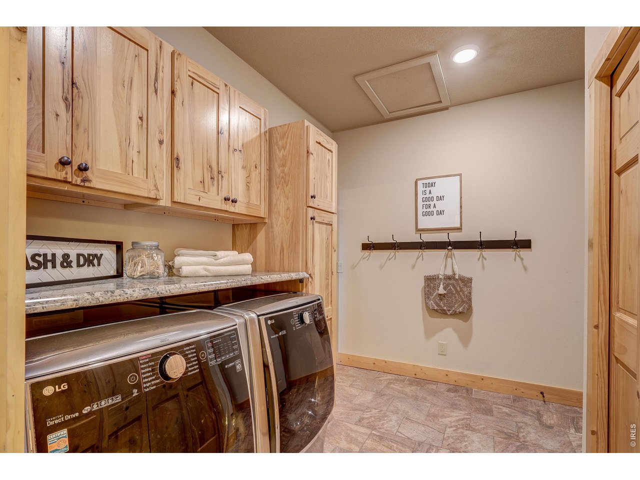 18298 Romar Ranch Road Carr, CO 80612 - Photo 12 of 49 a kitchen with stainless steel appliances granite countertop a refrigerator a stove and a sink