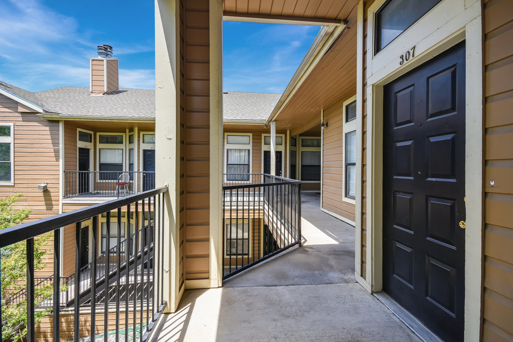 2802 Nueces Street, Unit 307 Austin, TX 78705 - Photo 7 of 16 a view of balcony with staircase